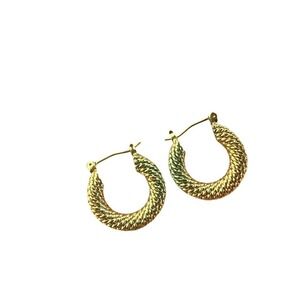 Gold hoop earrings with a textured finish